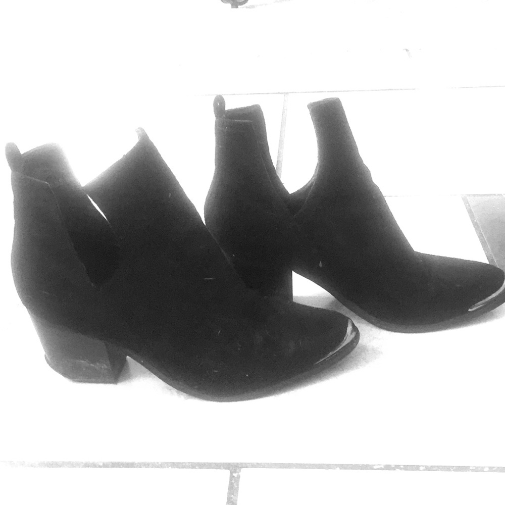 Black suede pointed toe boot with metal tip